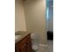 Bathroom with granite countertop and laundry hamper at 2524 Good Homes Rd, Orlando, FL 32818