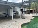 Pool area with patio and outdoor kitchen at 2524 Good Homes Rd, Orlando, FL 32818