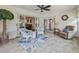 Relaxing sunroom, featuring sliding doors and tiled floor at 533 Grand Vista Trl, Leesburg, FL 34748