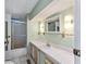 Bathroom with tub, shower, and vanity at 512 Palo Verde Dr, Leesburg, FL 34748