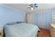 Bedroom with double bed and built-in closets at 512 Palo Verde Dr, Leesburg, FL 34748