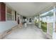 Covered patio with access to the home and backyard at 512 Palo Verde Dr, Leesburg, FL 34748