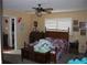 Main bedroom with a wooden bed and dresser at 4269 Lake Eleanor Dr, Mount Dora, FL 32757