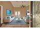 Living room with hardwood floors, sofas and rug at 27303 Gingerbread Pl, Leesburg, FL 34748