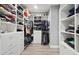 Large walk-in closet with ample shelving and hanging space at 1136 Brick Rd, Winter Garden, FL 34787