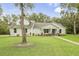 Single story home with landscaped yard at 1136 Brick Rd, Winter Garden, FL 34787
