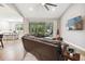 L-shaped sectional sofa and view of backyard at 1136 Brick Rd, Winter Garden, FL 34787