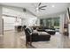 Open living room with kitchen and backyard access at 1136 Brick Rd, Winter Garden, FL 34787