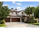 Two-story home with three-car garage at 9424 Royal Estates Blvd, Orlando, FL 32836