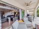 Relaxing covered patio with wicker furniture and access to the backyard at 9424 Royal Estates Blvd, Orlando, FL 32836