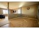 Open living area with wall separating it from another room at 11430 Wishing Well Ln, Clermont, FL 34711
