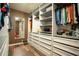 Large walk-in closet with plenty of storage at 11430 Wishing Well Ln, Clermont, FL 34711