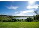 Scenic lake view from the backyard at 11430 Wishing Well Ln, Clermont, FL 34711