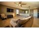 Spacious living room with large TV and comfortable seating at 11430 Wishing Well Ln, Clermont, FL 34711