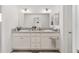 Double vanity bathroom with modern finishes at 11394 Zimmerman Path, Oxford, FL 34484