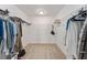 Large walk-in closet with ample shelving and hanging space at 11394 Zimmerman Path, Oxford, FL 34484