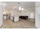 Open kitchen features stainless steel appliances and an island at 11394 Zimmerman Path, Oxford, FL 34484