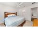 King-size bed in spacious bedroom with walk-in closet at 11394 Zimmerman Path, Oxford, FL 34484