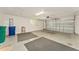 Two-car garage, freshly painted and ready for your vehicles at 11394 Zimmerman Path, Oxford, FL 34484