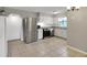 Bright kitchen with stainless steel appliances and granite countertops at 11635 Se Highway 42, Weirsdale, FL 32195