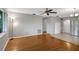 Hardwood floor living room, open to kitchen at 11635 Se Highway 42, Weirsdale, FL 32195
