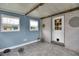 Sunroom with tiled floor, and neutral-toned walls at 11635 Se Highway 42, Weirsdale, FL 32195