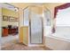 Updated bathroom with a walk-in shower and separate tub at 3506 Mulberry Grove Loop, Leesburg, FL 34748