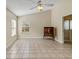 Bright sunroom with tile floors and access to the outdoors at 3912 Plantation Blvd, Leesburg, FL 34748