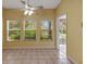 Bright breakfast nook with tile floors and plenty of natural light at 3912 Plantation Blvd, Leesburg, FL 34748