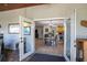 French doors leading from dining area to the backyard patio at 7425 Lake Marni Ct, Mount Dora, FL 32757