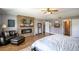 Main bedroom features a fireplace and built-in shelving at 7425 Lake Marni Ct, Mount Dora, FL 32757