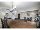 Dining room with a view of the staircase and entryway at 7425 Lake Marni Ct, Mount Dora, FL 32757