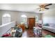 Playroom with hardwood floors, ample natural light, and built-in shelving at 7425 Lake Marni Ct, Mount Dora, FL 32757
