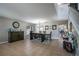 Spacious dining room featuring a large wooden table and tile floors at 7425 Lake Marni Ct, Mount Dora, FL 32757