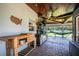 Outdoor kitchen with grill and prep area at 7425 Lake Marni Ct, Mount Dora, FL 32757