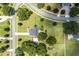 Aerial view showing house, yard, and neighborhood at 7425 Lake Marni Ct, Mount Dora, FL 32757