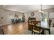 Dining area with seating for six and access to the kitchen at 7425 Lake Marni Ct, Mount Dora, FL 32757