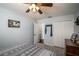 Bedroom with double door closet and carpet flooring at 7425 Lake Marni Ct, Mount Dora, FL 32757