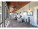 Relaxing screened porch with patio furniture at 7425 Lake Marni Ct, Mount Dora, FL 32757