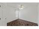 Simple bedroom with ceiling fan and carpet floor at 36649 Sundance Dr, Grand Island, FL 32735