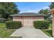 View of a pink storage shed with double doors at 36649 Sundance Dr, Grand Island, FL 32735
