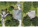 Aerial view of houses with solar panels at 36649 Sundance Dr, Grand Island, FL 32735