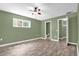 Bright bedroom with en-suite bathroom and walk-in closet at 1500 Cobble Ln, Mount Dora, FL 32757