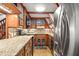Modern kitchen with granite countertops and stainless steel appliances at 507 Lakeshore Dr, Eustis, FL 32726