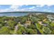 Aerial view of property near lake and town at 507 Lakeshore Dr, Eustis, FL 32726