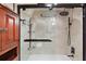 Modern bathroom with a large walk-in shower and contemporary fixtures at 507 Lakeshore Dr, Eustis, FL 32726