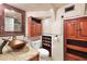 Bathroom with updated vanity, a glass shower, and built in storage at 507 Lakeshore Dr, Eustis, FL 32726