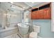 Spa-like bathroom with a walk-in shower and soaking tub at 507 Lakeshore Dr, Eustis, FL 32726
