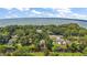 Stunning aerial showcasing waterfront property and canal access at 507 Lakeshore Dr, Eustis, FL 32726