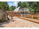 Large backyard patio with brick pavers, and access to a multi-level home at 507 Lakeshore Dr, Eustis, FL 32726